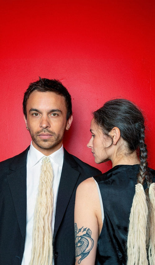 Christopher Mitchell paints his salon dark red